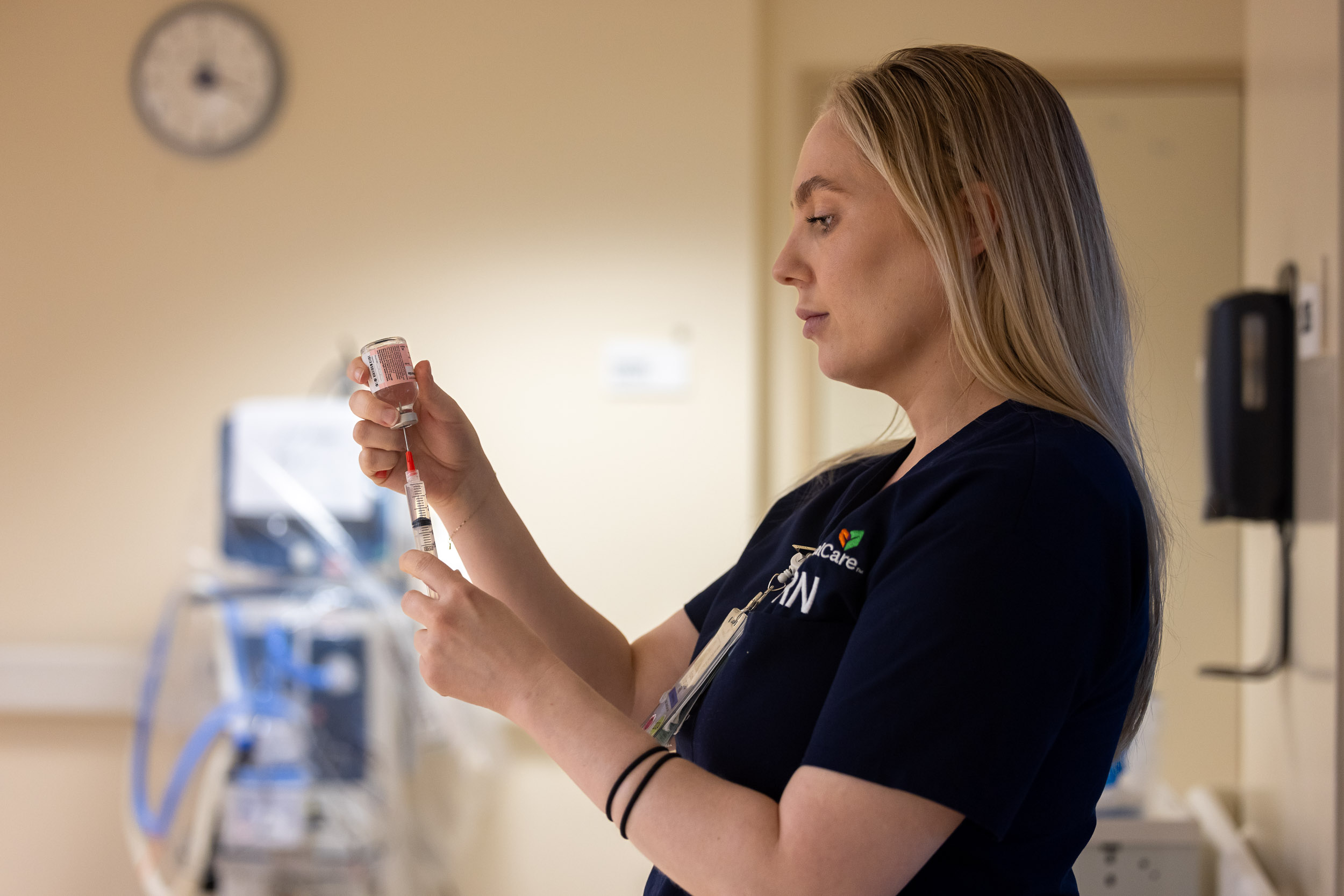 Long Beach Memorialcare of Long Beach Nurse Kirsten Shumaker extracts medicine from a vial.