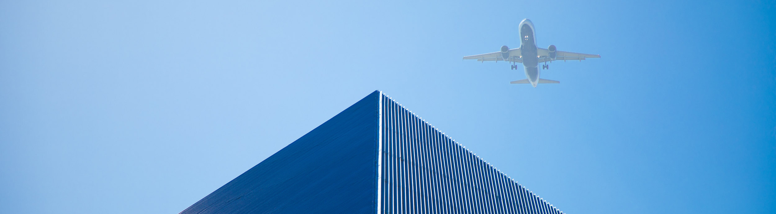 Plane flies over the Walter Pyramid