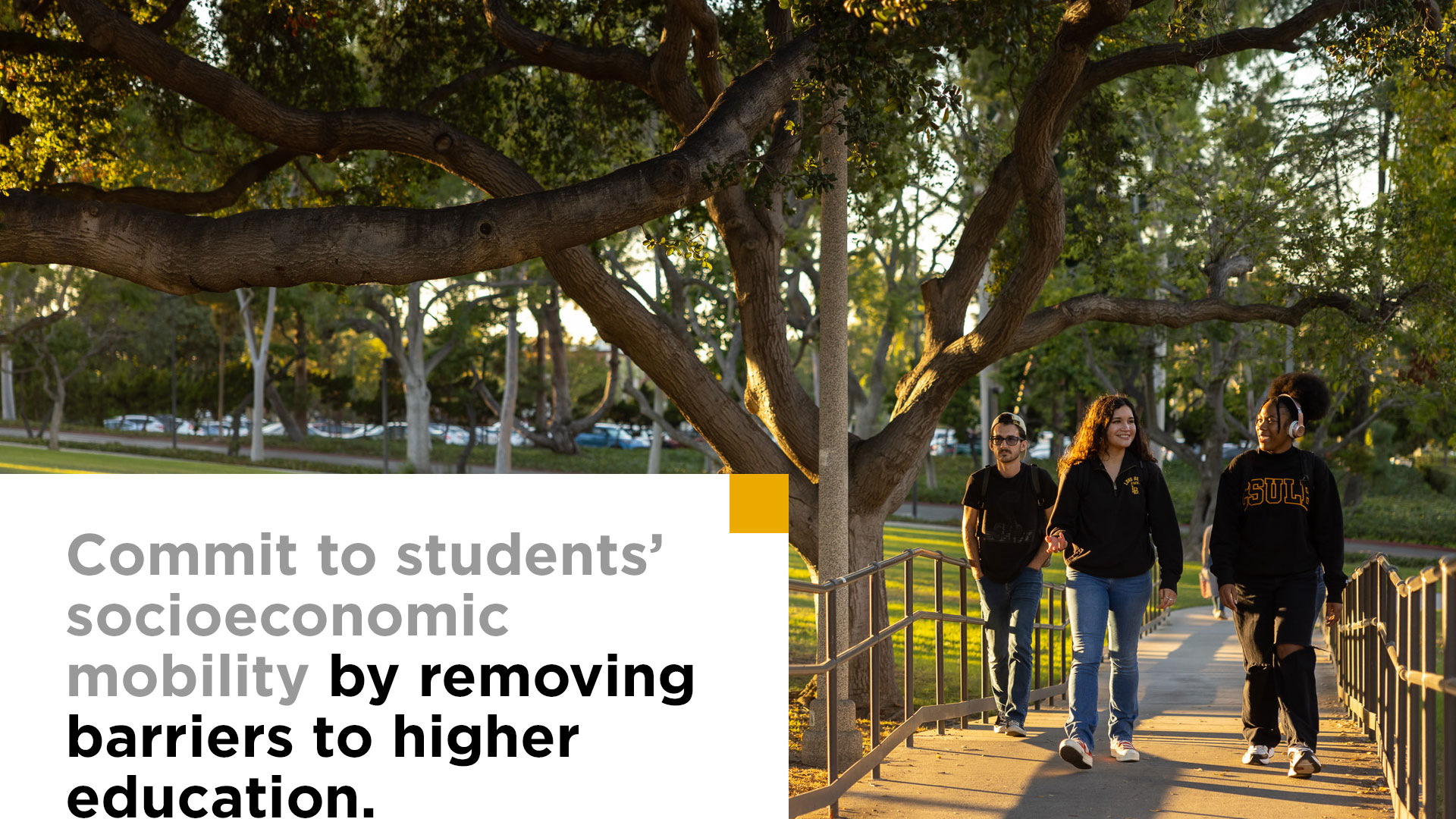 Commit to students’ socioeconomic mobility by removing barriers to higher education. Image shows students walking on campus. 