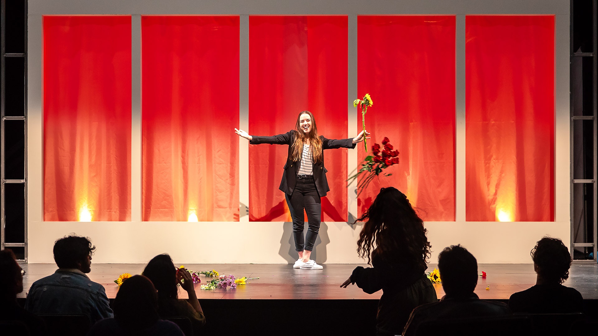 camryn-hohneker-slider.jpg Audience applause for Theater Arts Student's performance
