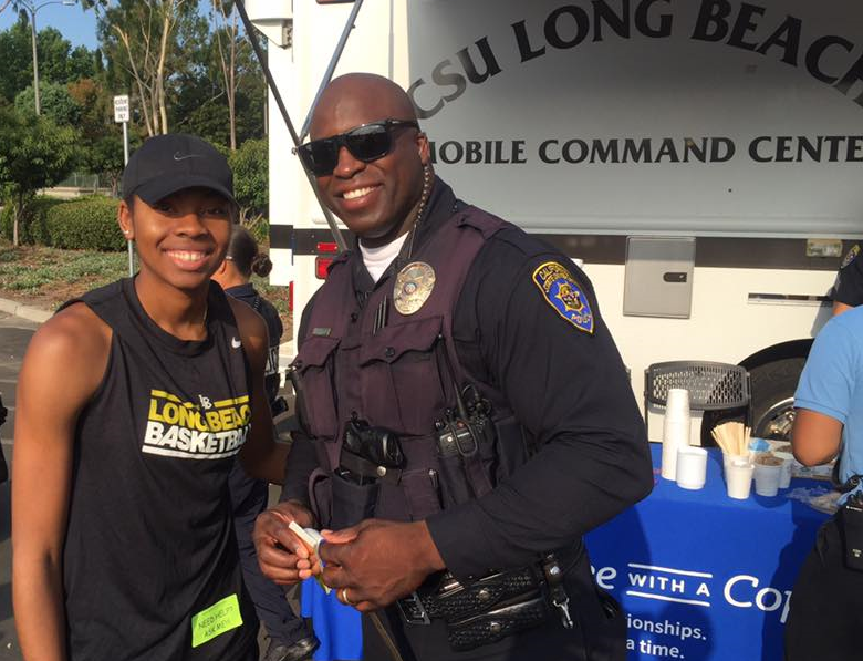 CSULB Officer and student at a Coffee With A Cop event
