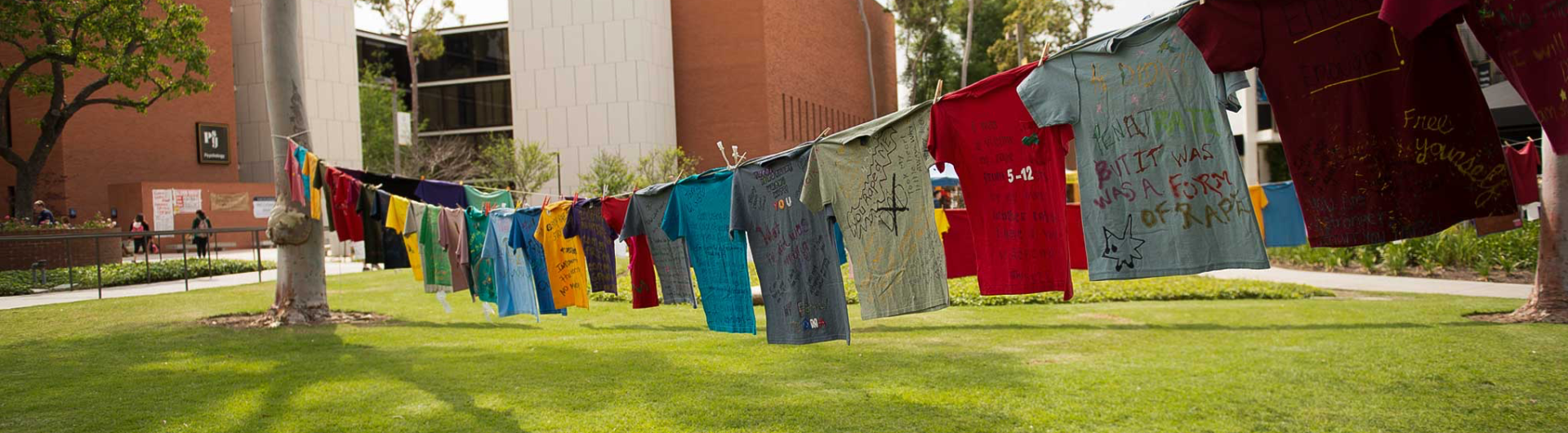 image of shirts hung on a clothesline with personal messages on them