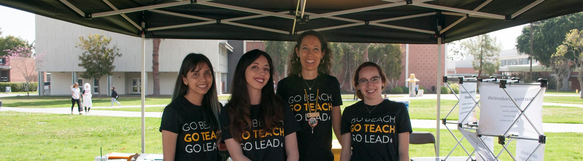 College of Education Staff and Student Ambassadors at the Ed Week Info Booth