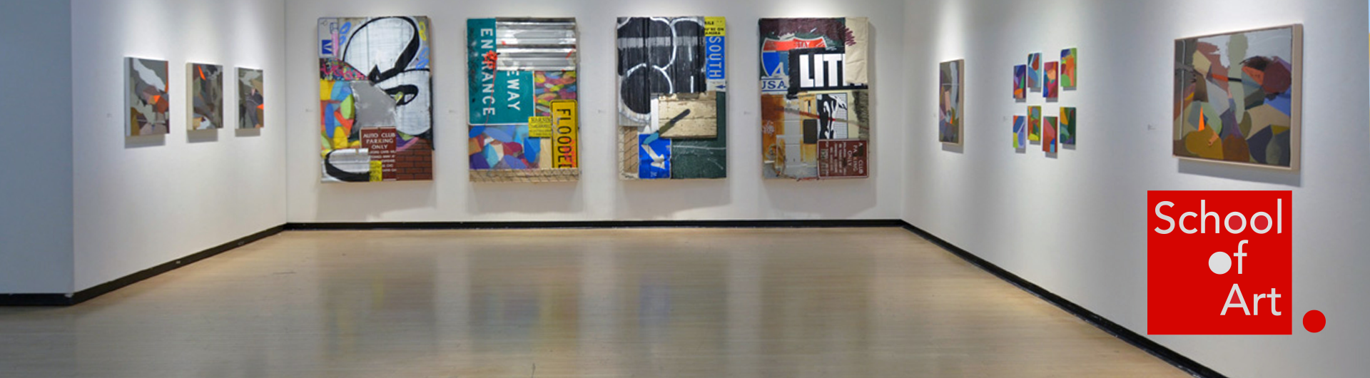 Gallery walls. Main view is four large mixed media pieces depicting road signs and graffiti art. 
