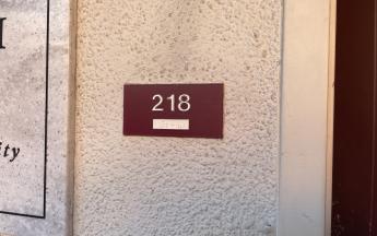 classroom 218 sign