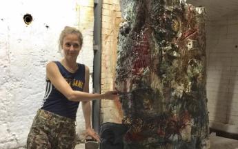 Artist in residence Sylvie Auvray with just-fired work, 2019.