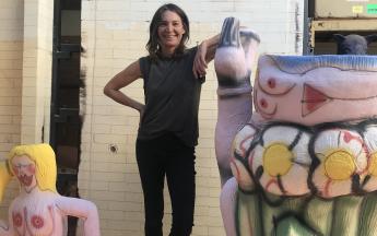 Artist in residence Ruby Neri with work in progress airbrushed with glaze ready for firing, 2018