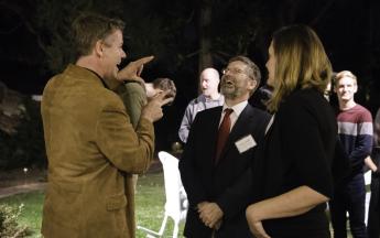 Biological Science’s Michael B. Harris, Bruno Pernet and Erika Holland share a laugh during the Public Knowledge Media Training culmination celebration at the Miller House on Nov. 29.
