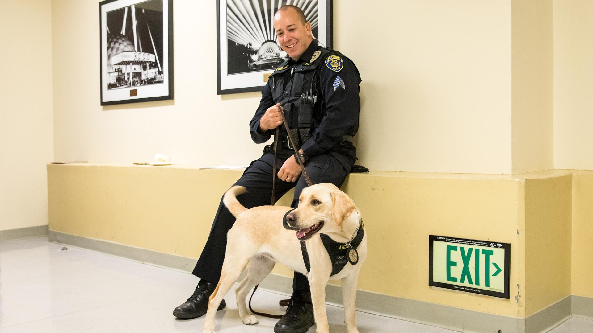 Avery rests with Sgt. Gonzalez