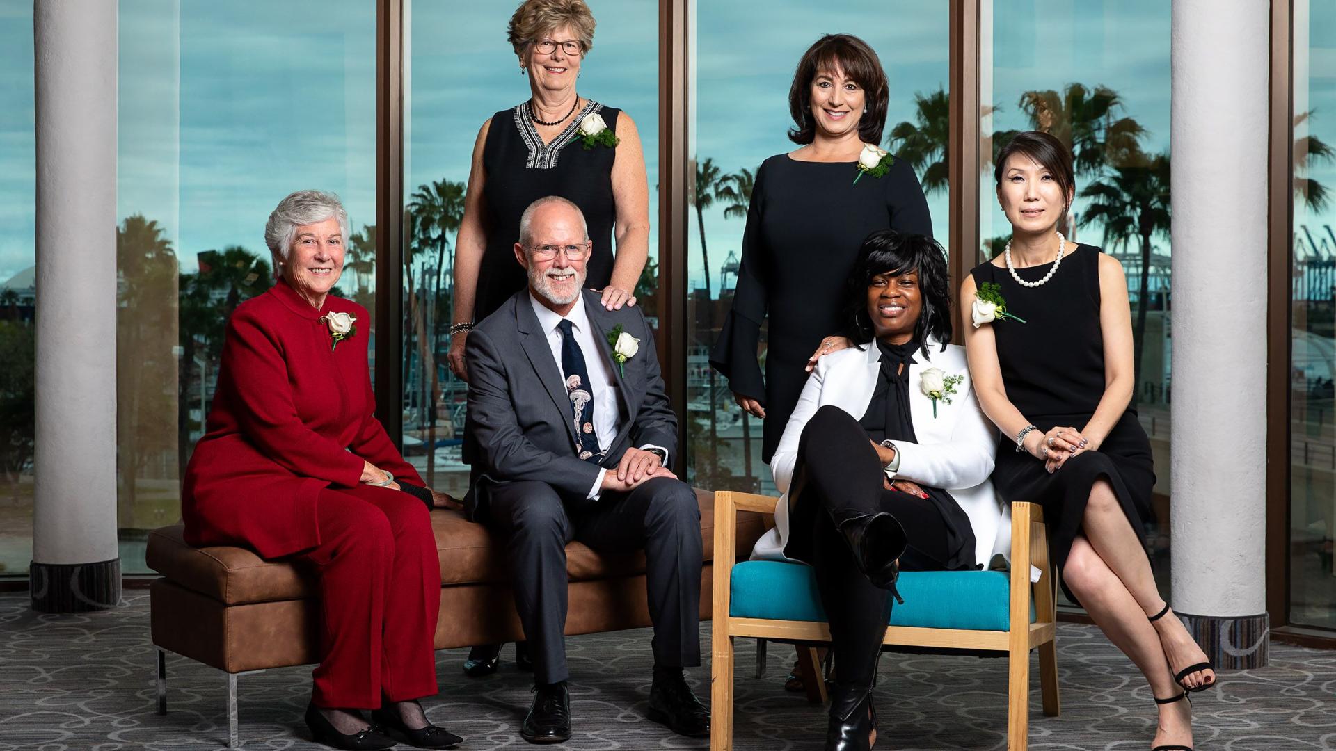 COB Distinguished Alumni Banquet 2019 Barbara Barcon people in chairs