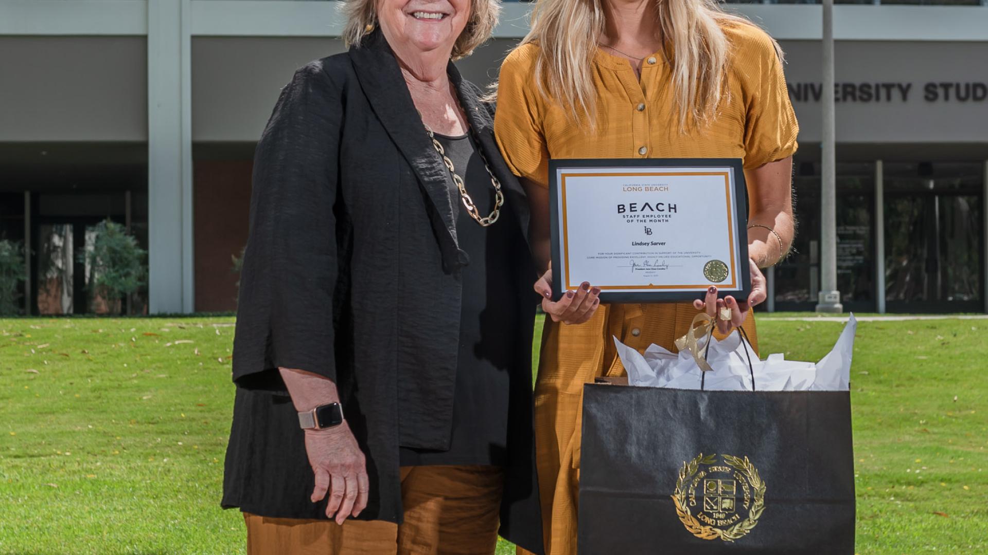 Jane Conoley, Lindsey Sarver, showing July 2019 Employee of the Month 