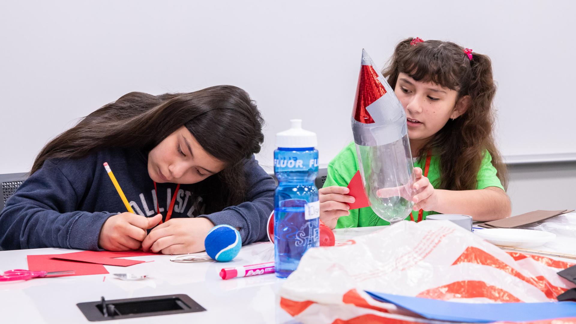Girls Build rocket at STEM camp