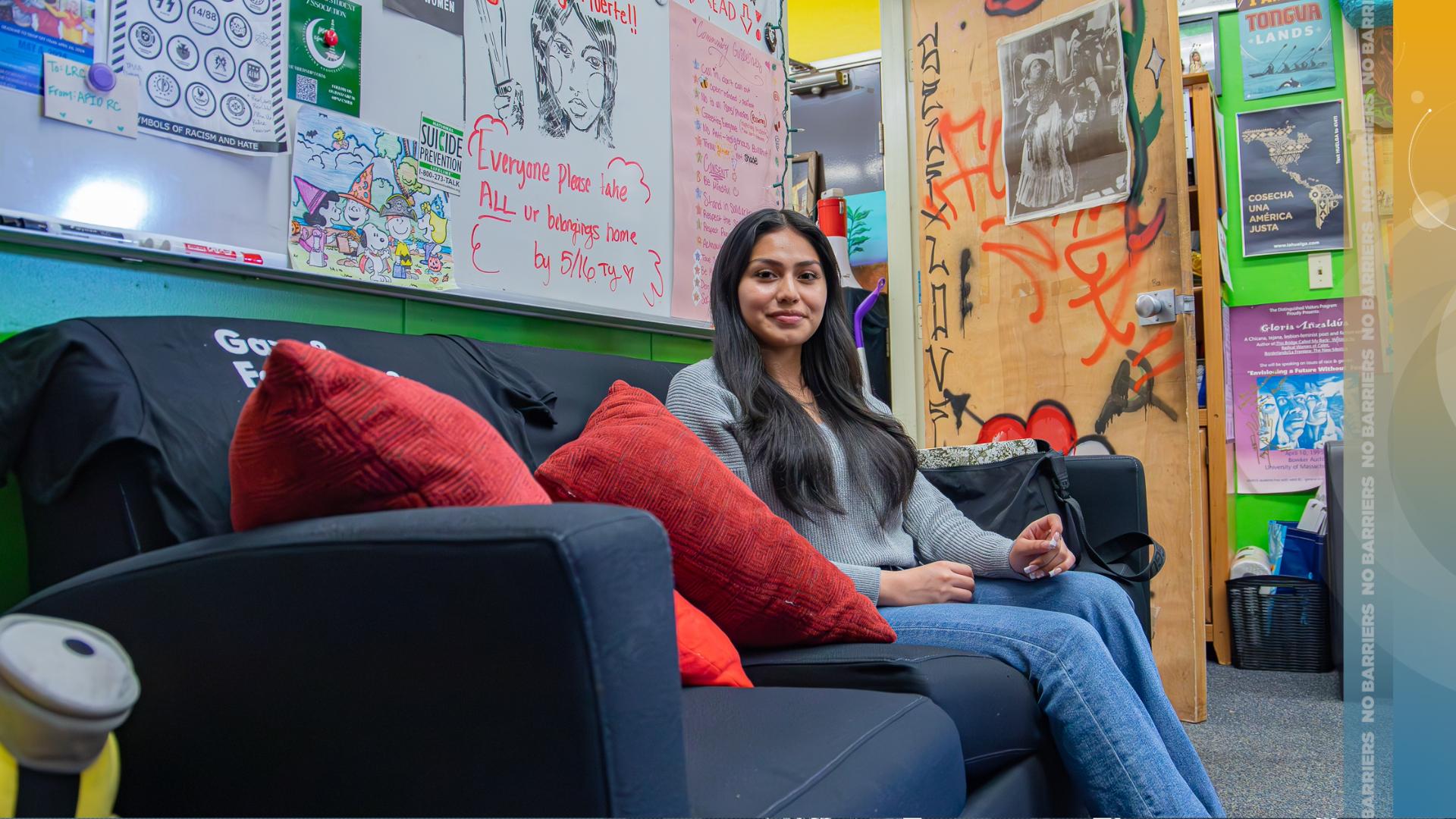 Ivonne Hernandez sits on a couch at the Latinx Resource Center