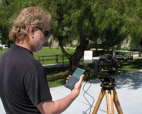 image of James Long reading windsock and theodolite