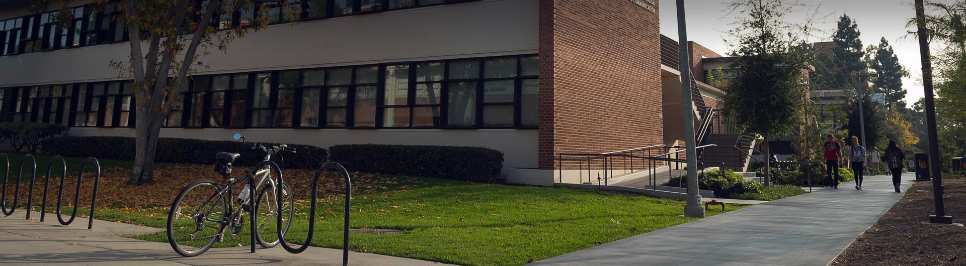 Bike rack by campus building