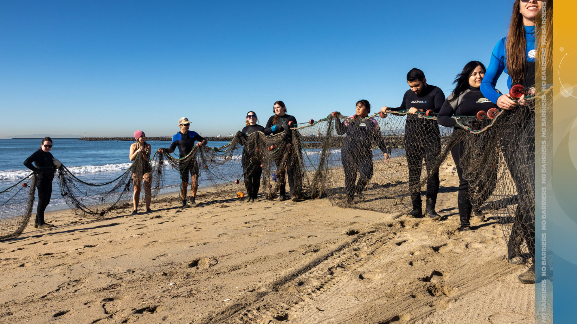 Students pulling in nets