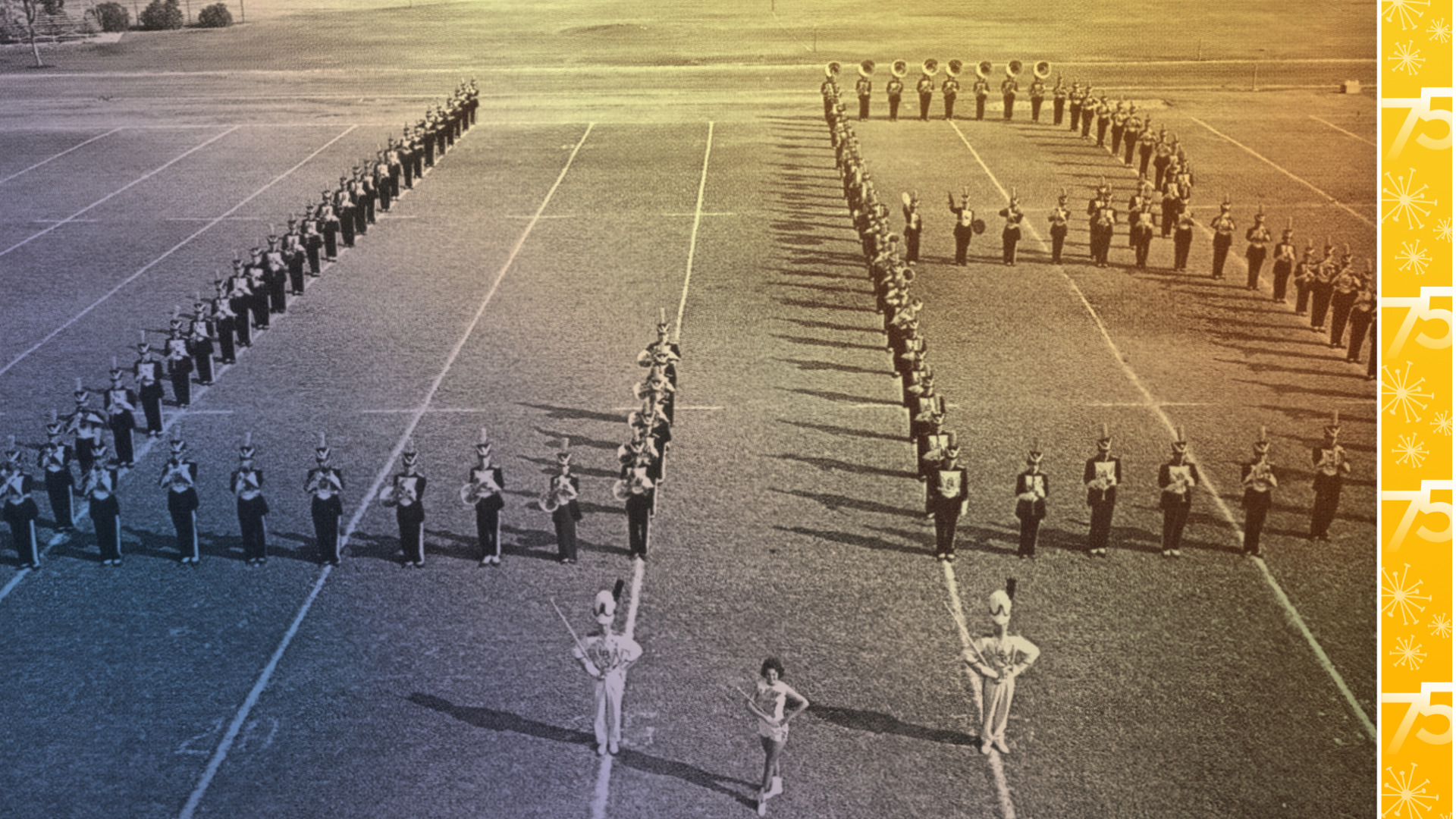 Marching band members in an "LB" formation on a football field