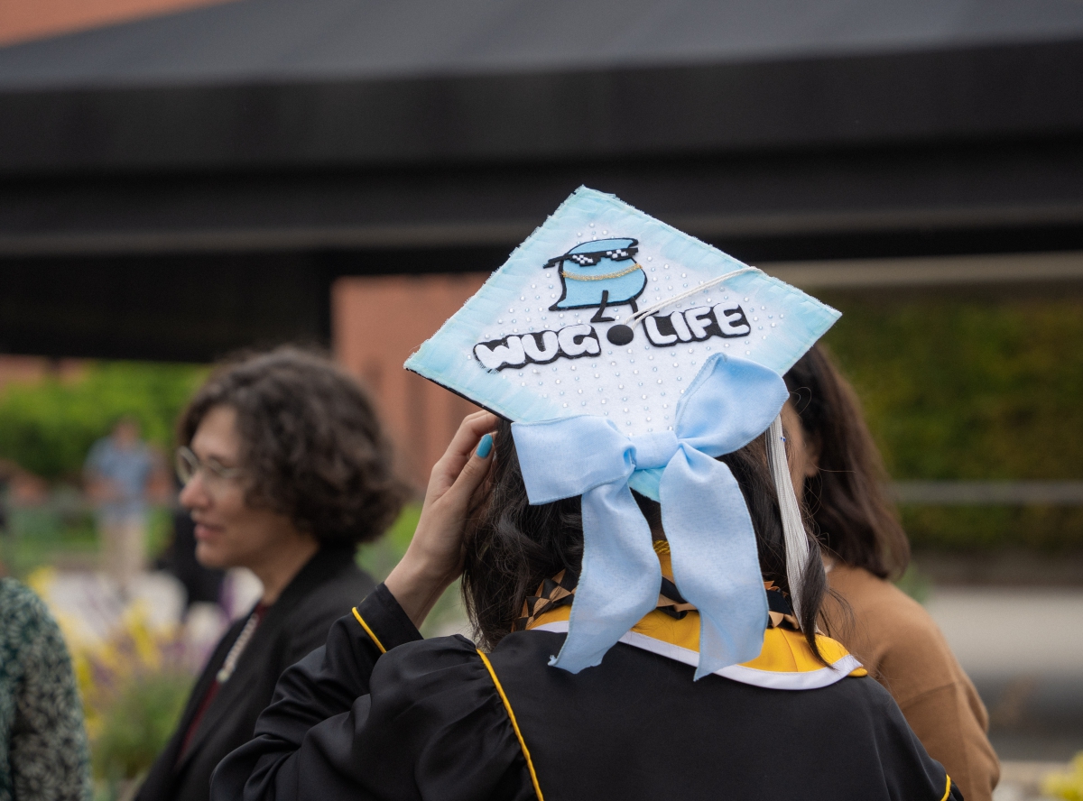 Grad cap with "Wug Life" design.