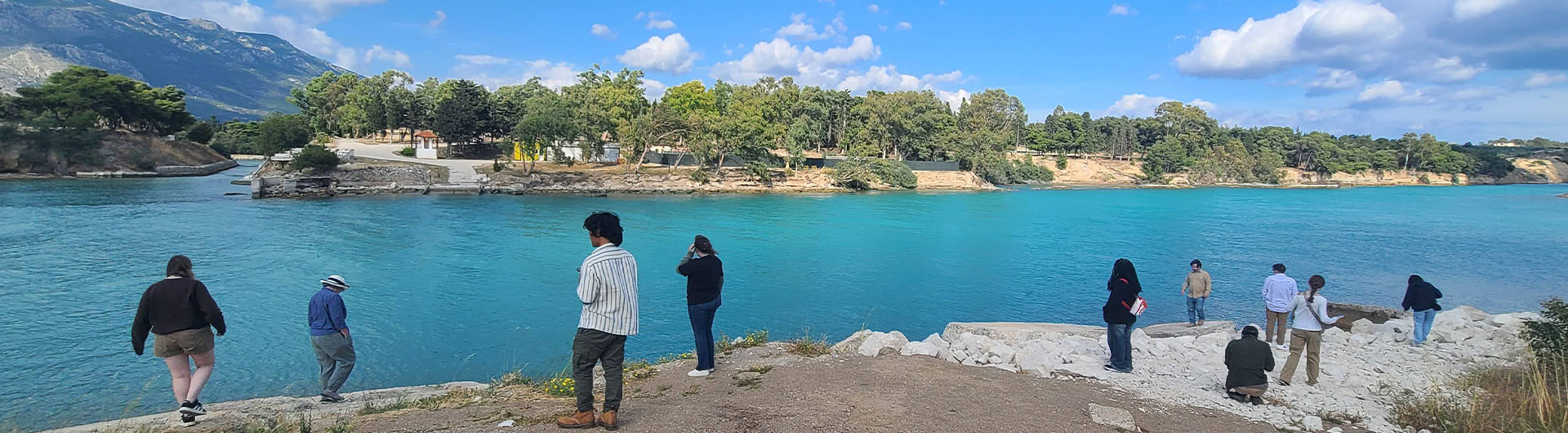 CSULB students overlooking Greek harbor