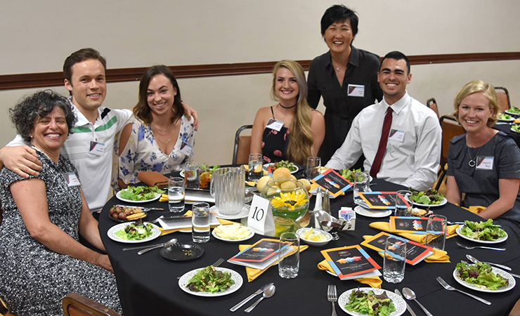 03-dinner-chi-ah-aaron-rafferty.jpg Student Training Core Director Chi-Ah Chun did her best to v