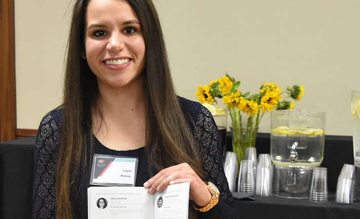 BUILD Scholar Layla Ramos shows off her page in the Commence