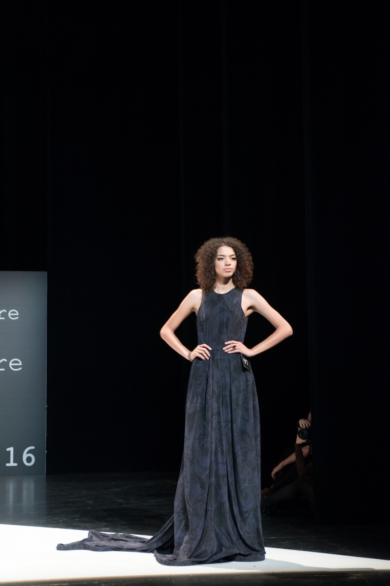 20160506_fashion_show_2016_046_mf.jpg A model poses at the end of the runway in a student-designed