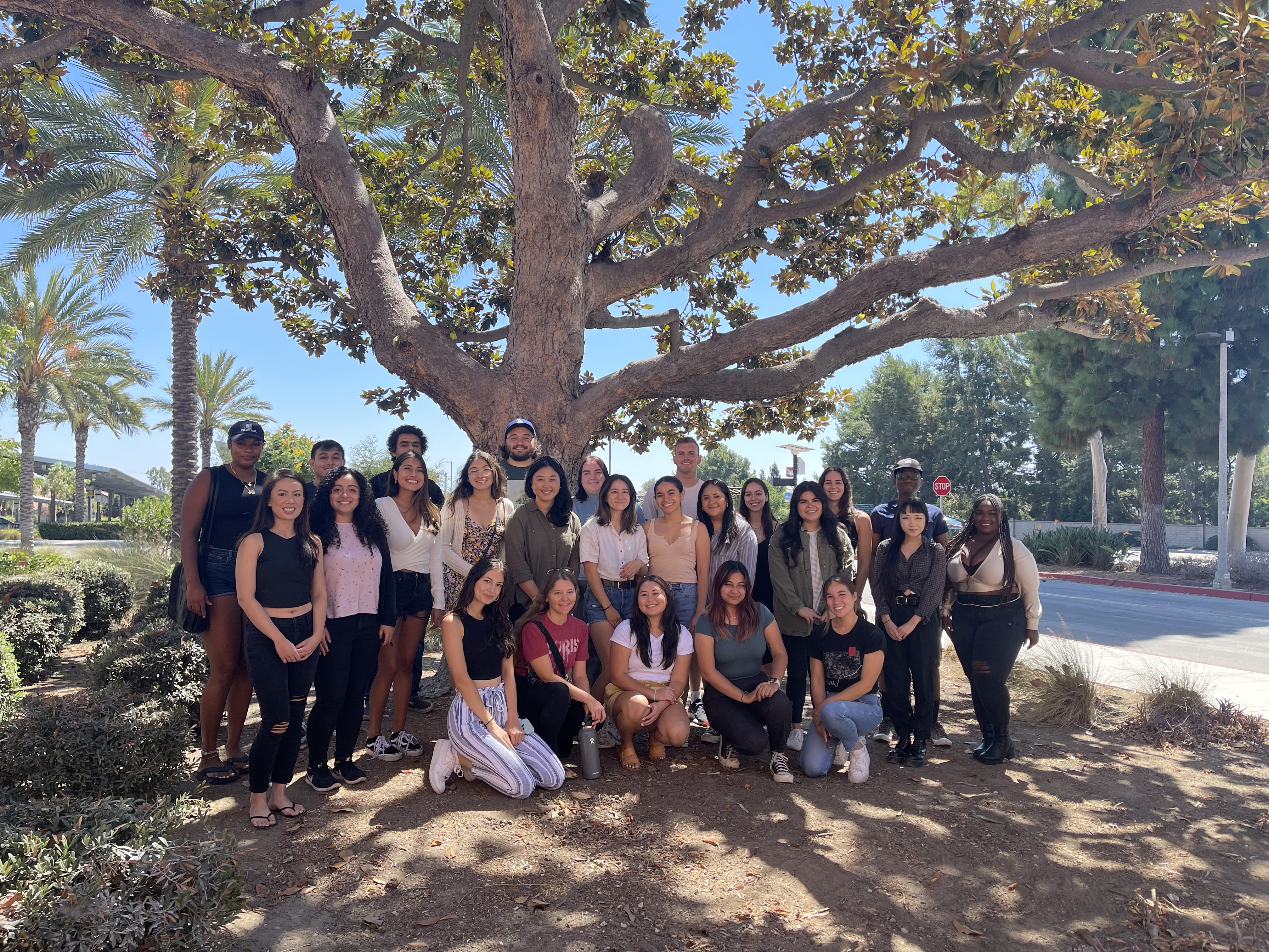 Content_CED_SchoolPsychology25Cohort Group of students in the School Psychology program pose under a tree