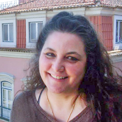 Millicent Accardi standing in front of building