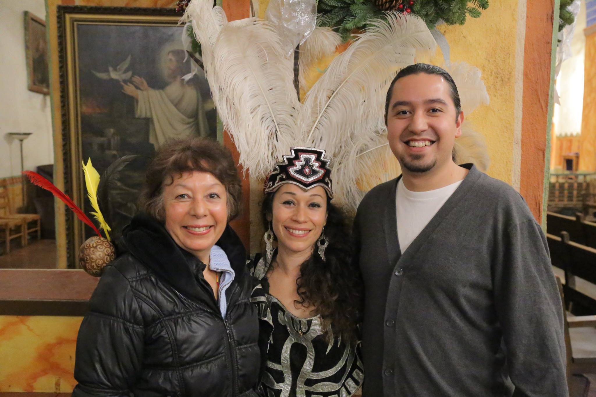 Marisol Duarte poses with her mother, Juanita Vargas, and younger brother, Ernesto Vasquez, after performing in an El Teatro Campesino production of La Virgen Del Tepeyac at the Mission in San Juan Bautista.