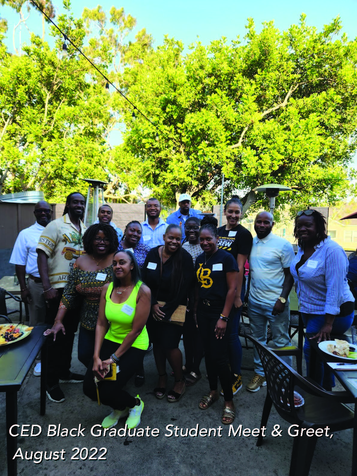 A group of people poses at a 2022 CED Black Grad Meet & Greet (held annually in August)