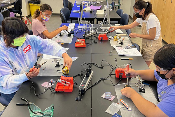 girls soldering