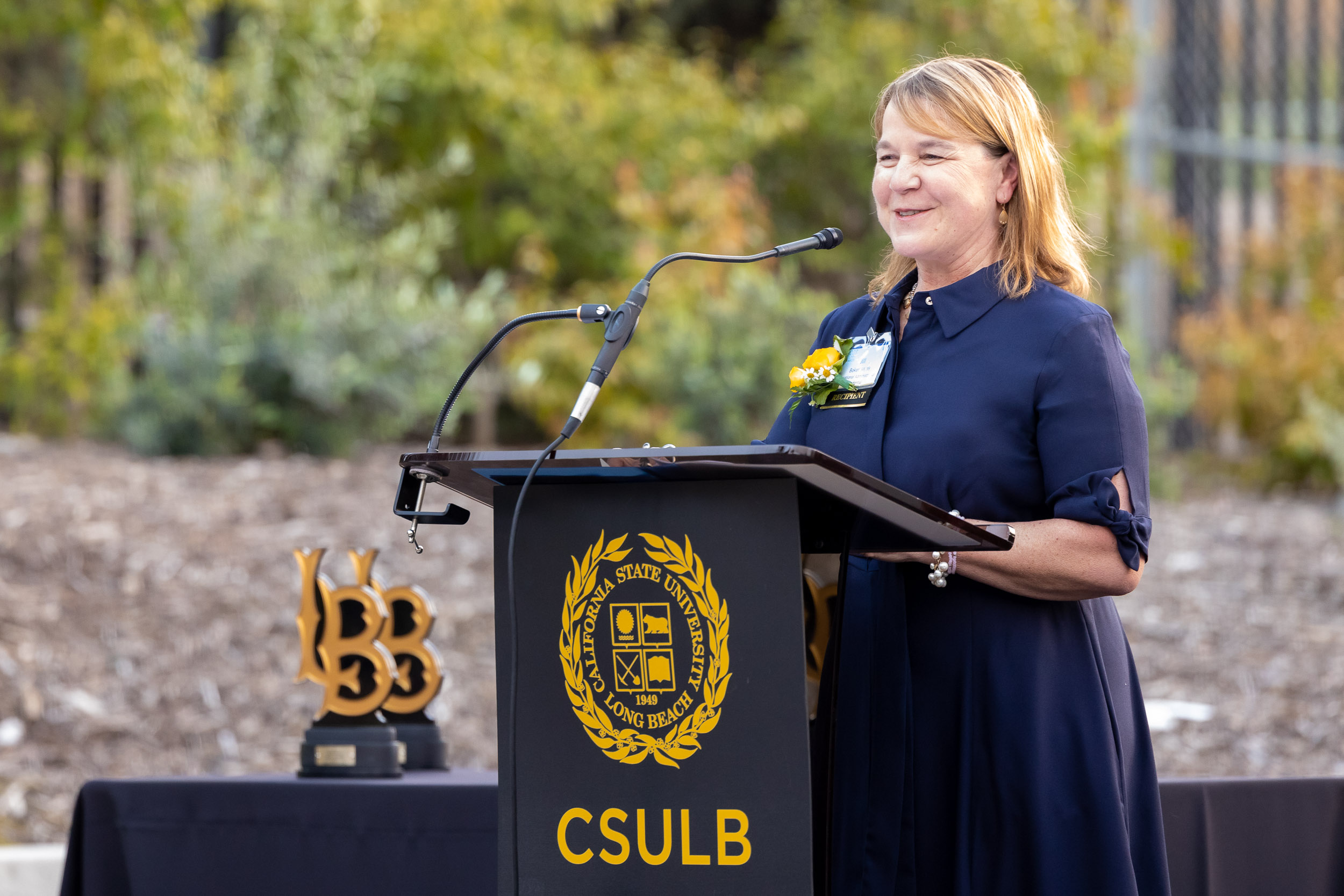 Jill Baker speaks at Distinguished Alumni Awards.