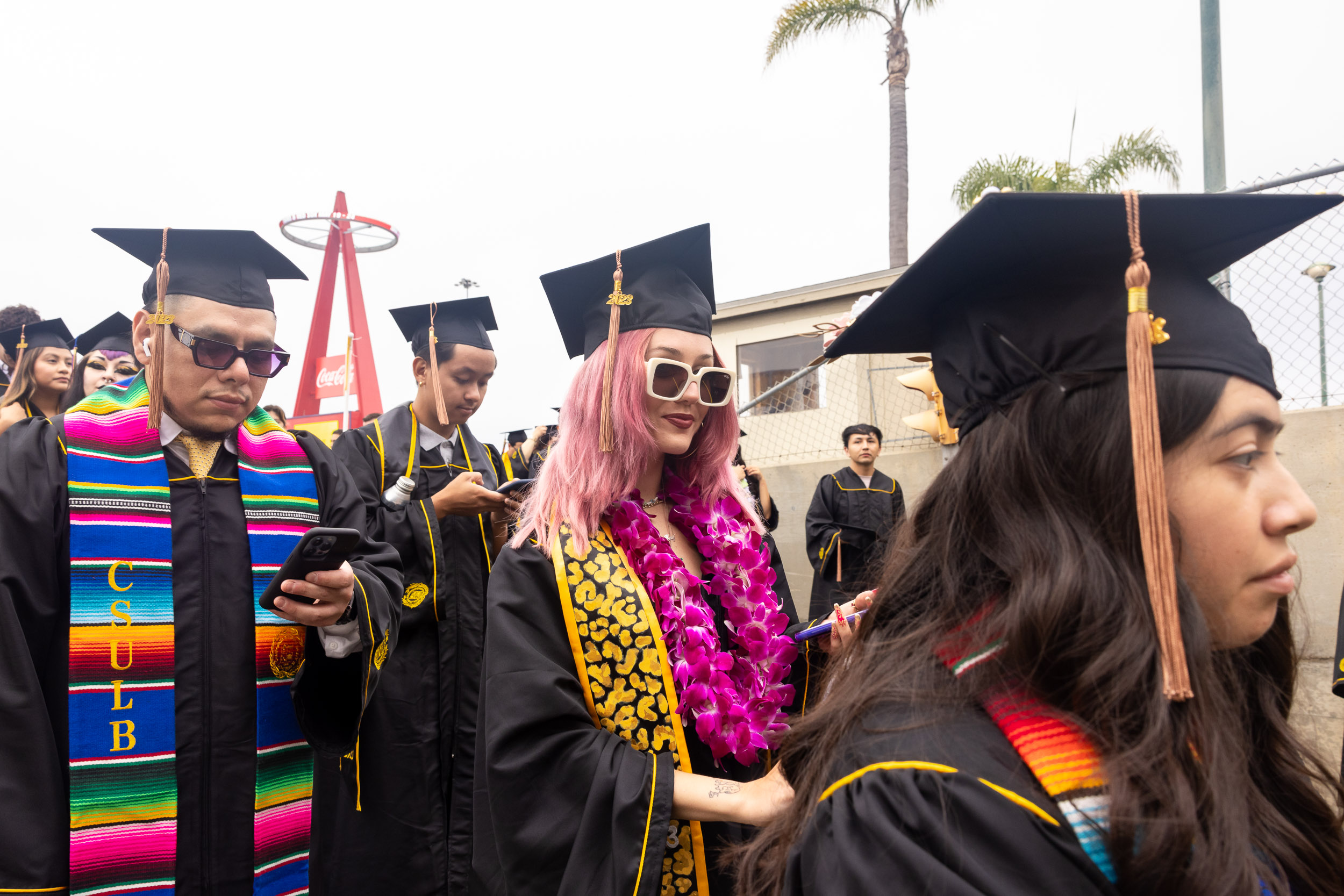 Graduates stand in line