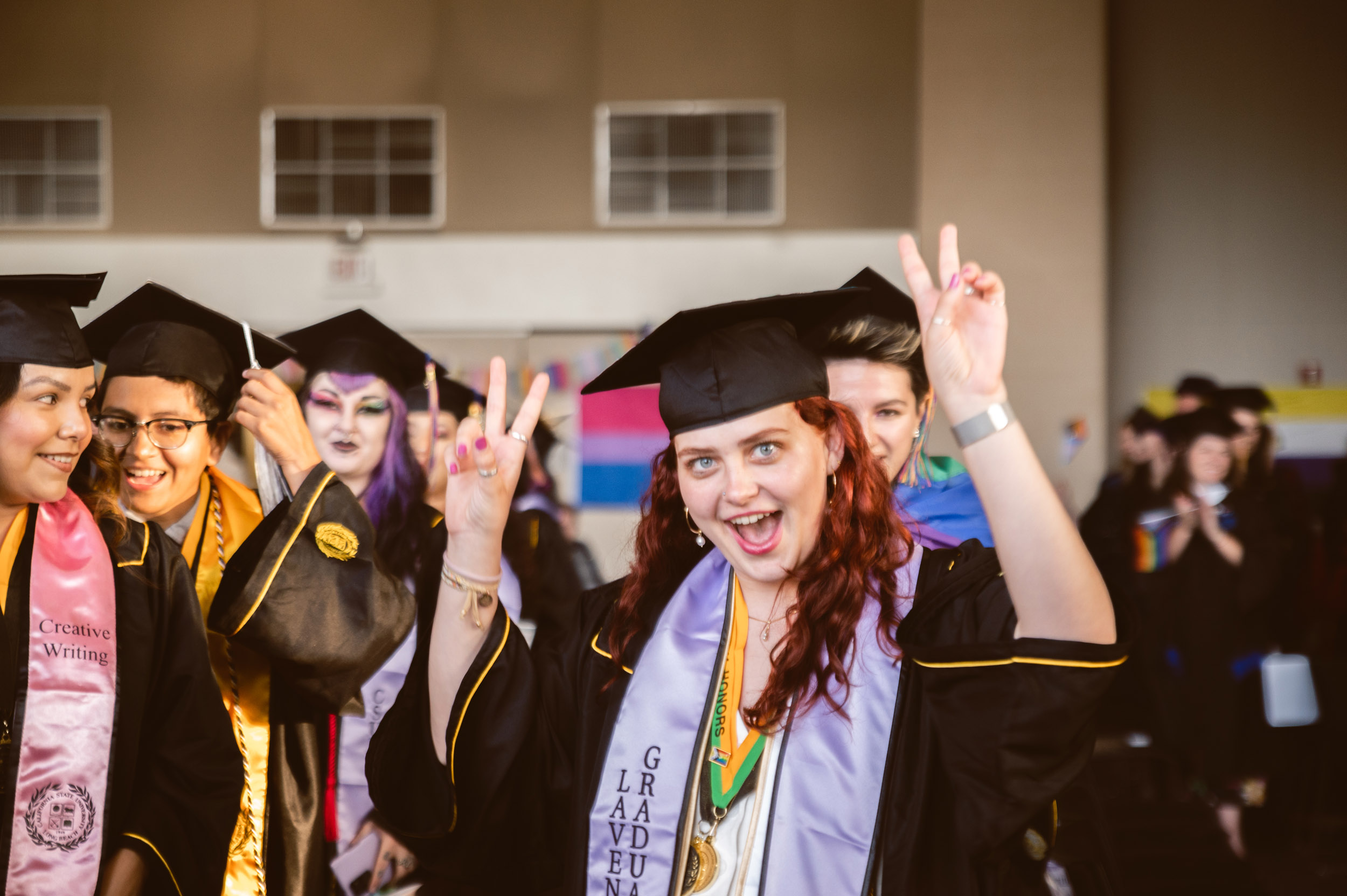 Student gives peace sign