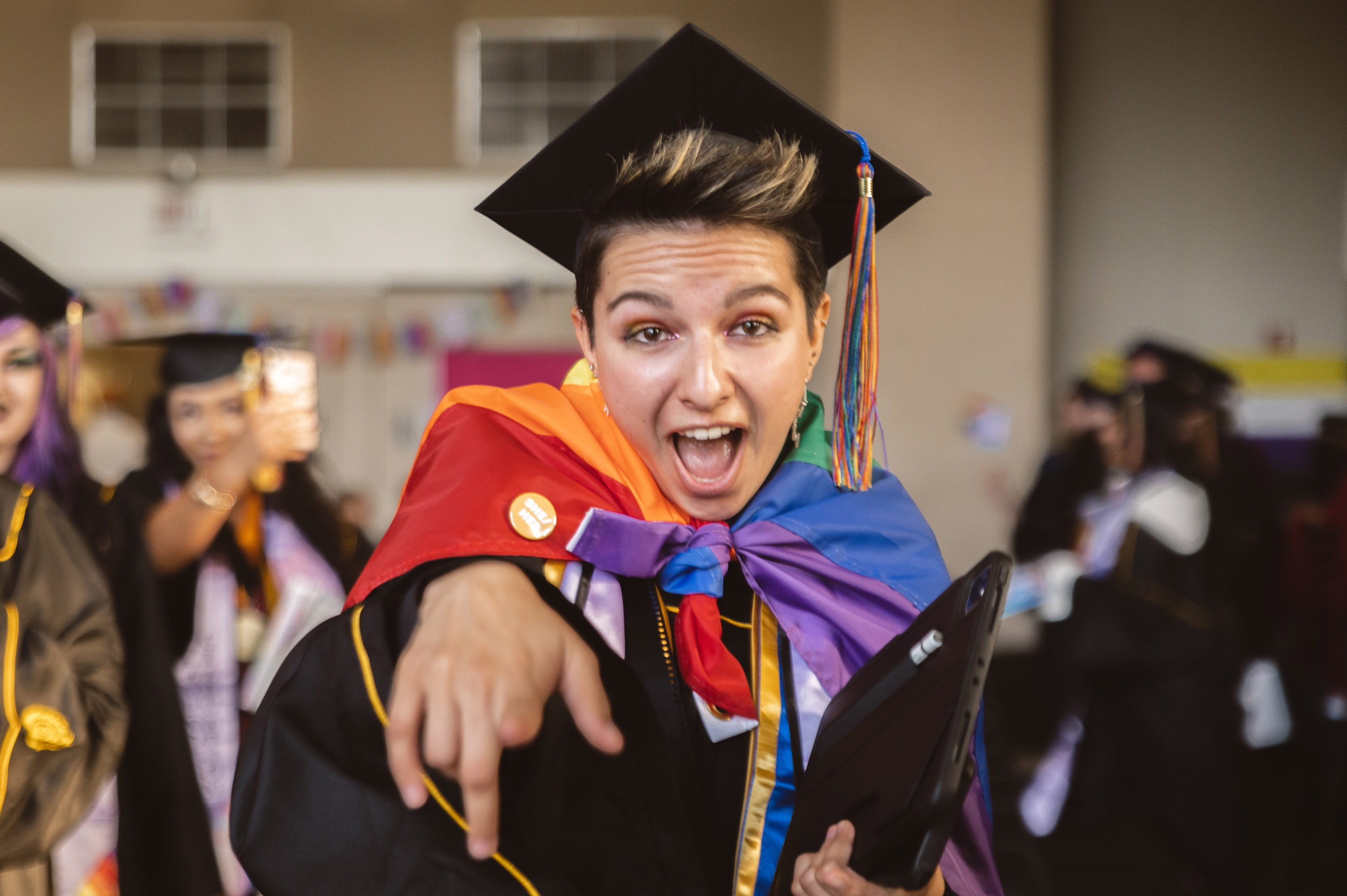 Student wearing rainbow flag