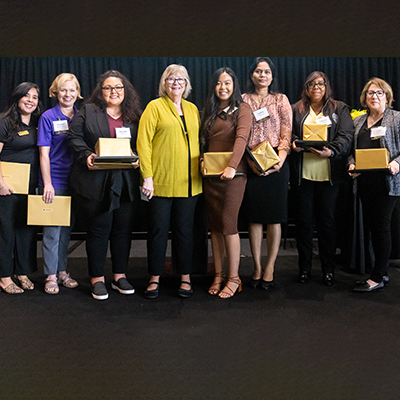 President Jane Close Conoley with Employees of the Year