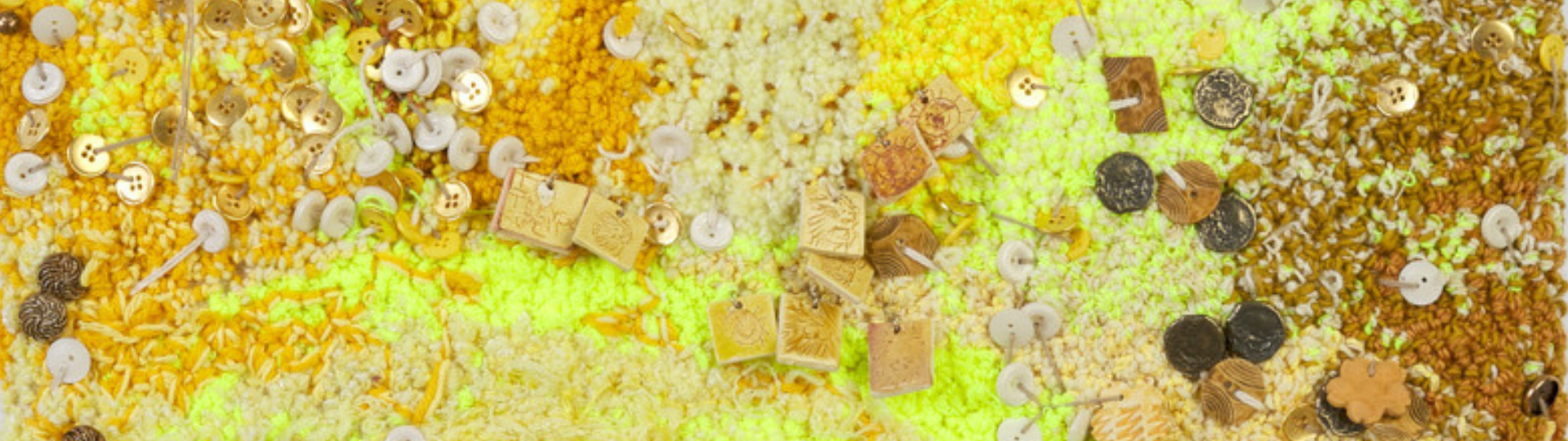 detail of Ericka Lopez, Untitled 111 (Yellow Textile with Buttons), 2022. punch-rug textile. 24 x 24 inches. Collection of Carolyn Campagna Kleefeld Contemporary Art Museum.