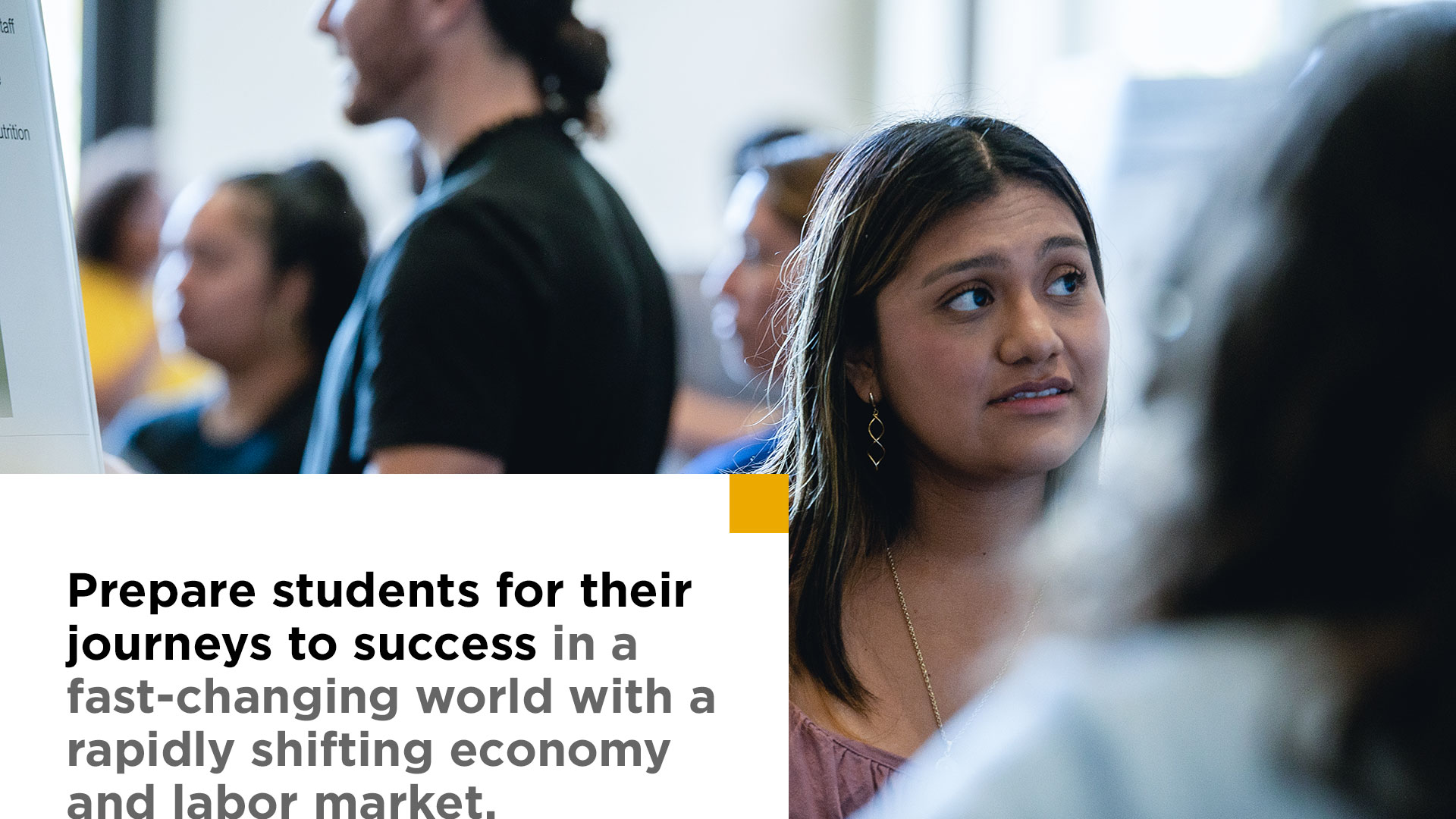 Prepare students for their journeys to success in a fast-changing world with a rapidly shifting economy and labor market. Image shows student looking off camera.