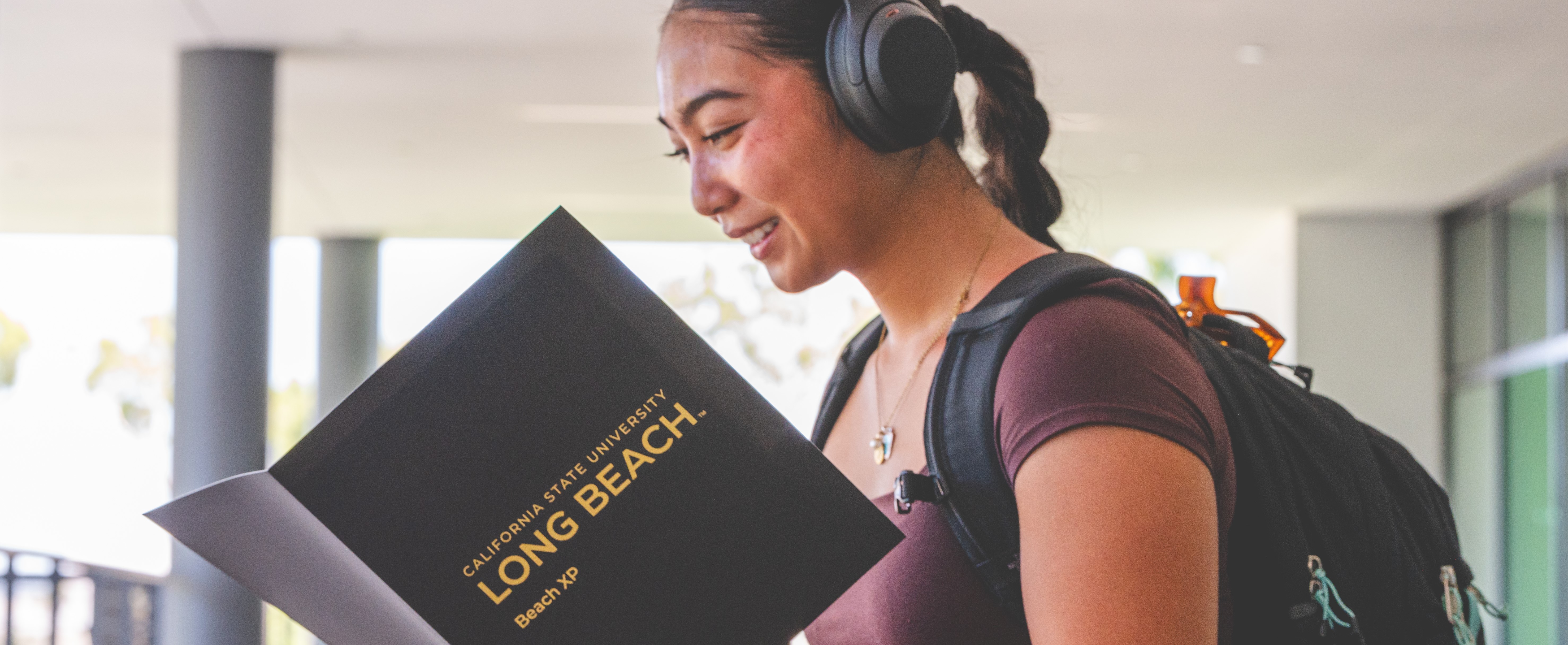 A student looks over her Beach XP folder on the first day of classes. 