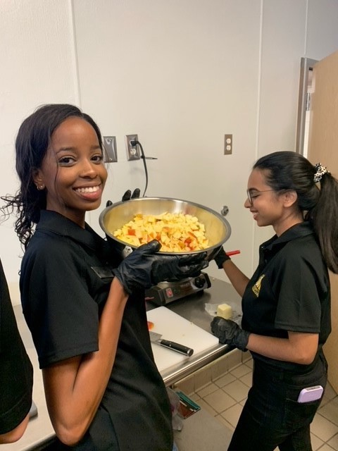 Two Presidents Ambassadors making food