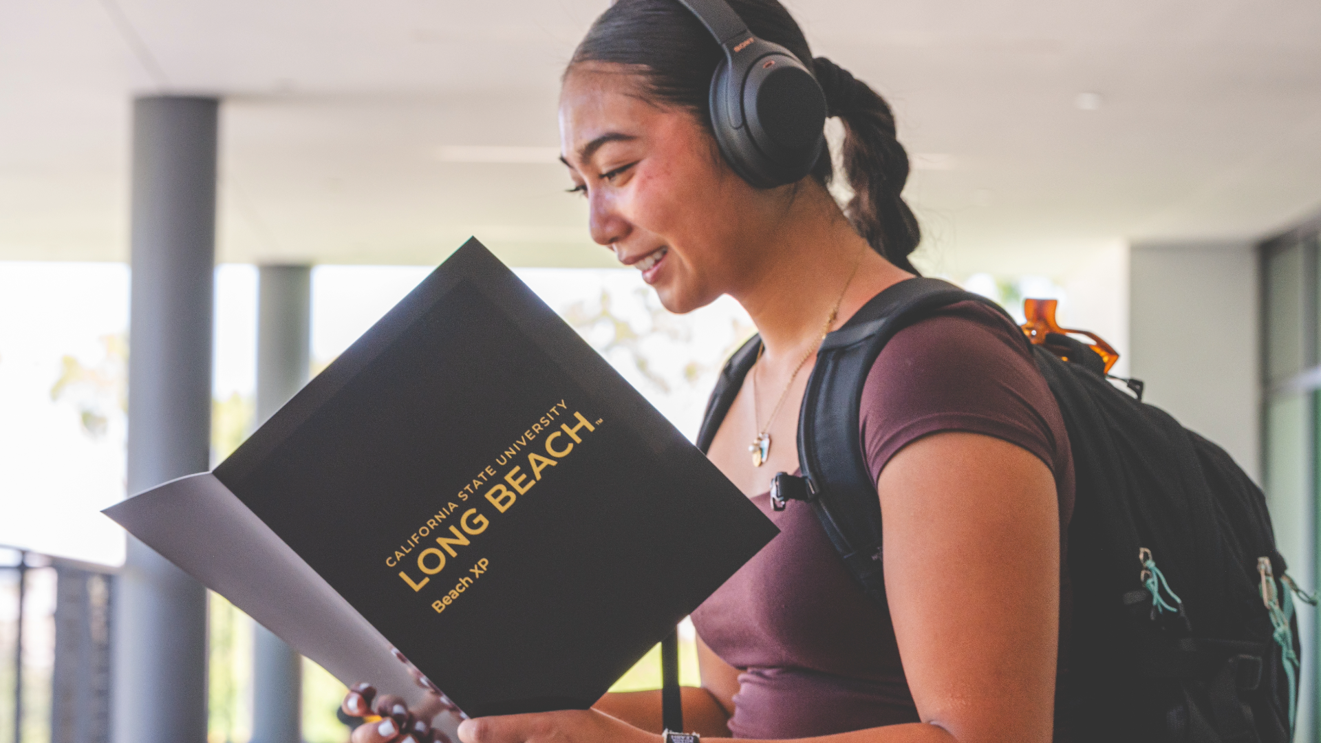 A student looks over her Beach XP folder on the first day of classes. 