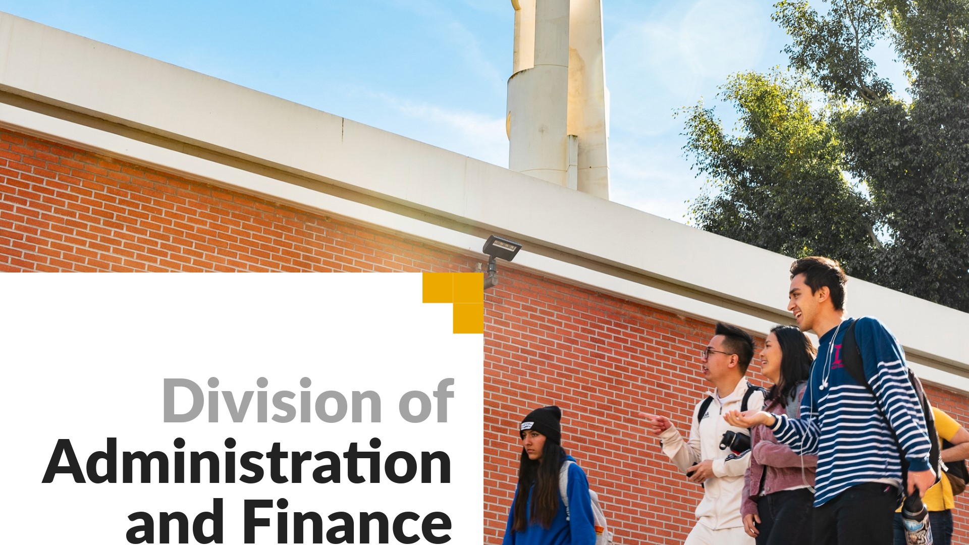 Division of Administration and Finance. Image shows students walking on campus. 
