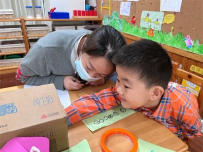 young child exploring science activity