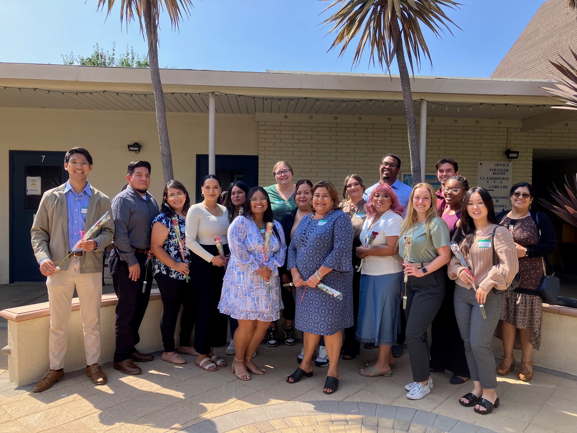 Students pose with CED Dean Anna Ortiz at a luncheon.