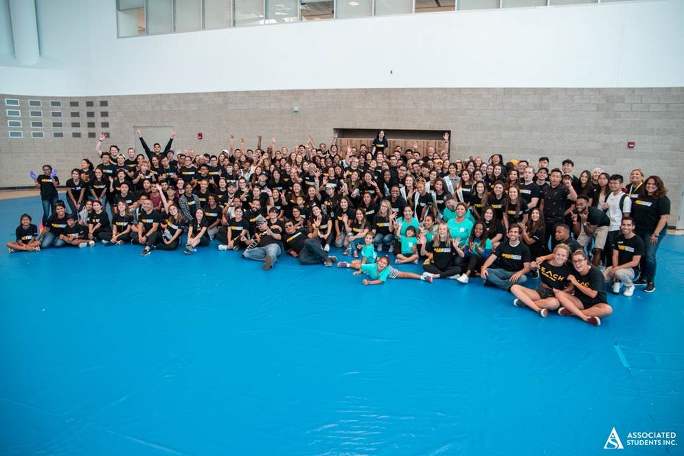 Group of athlete students posing in a gym