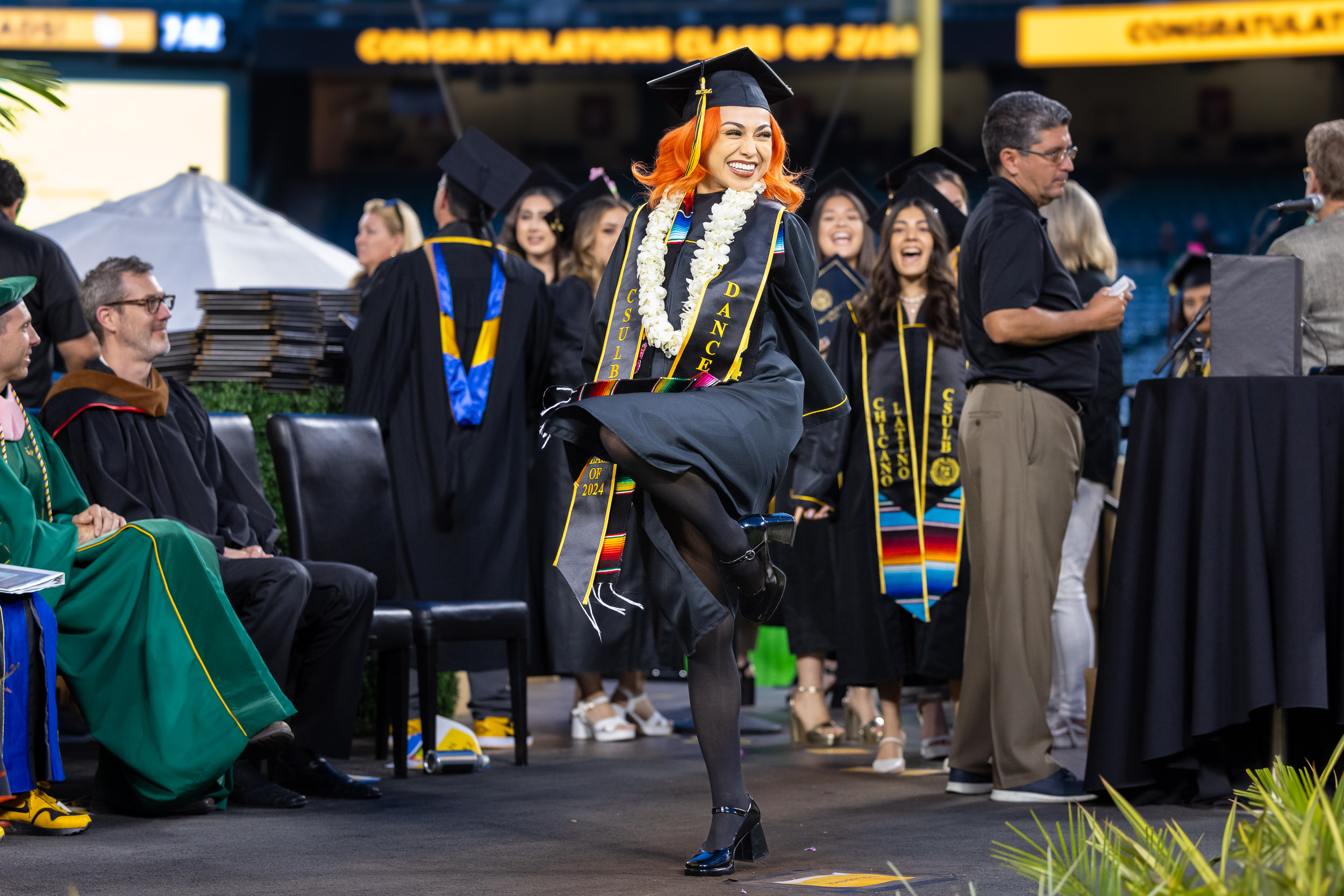 Dance graduate onstage during Commencement