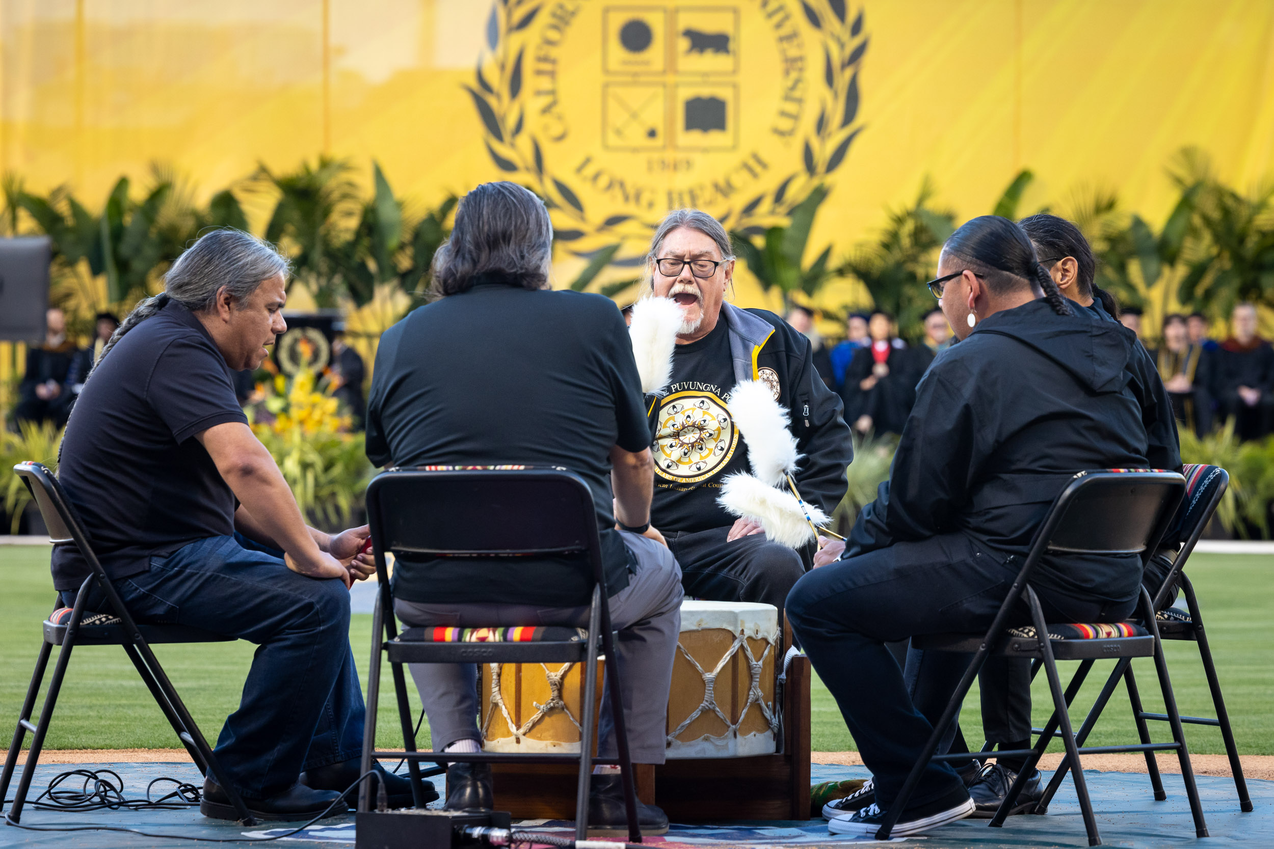American Indian drum playing at Commencement