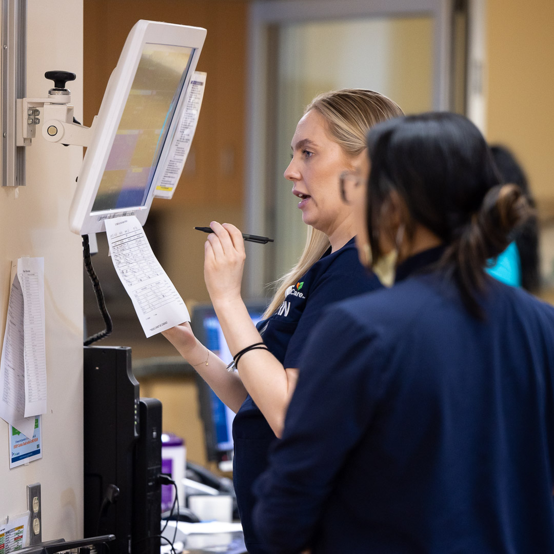 MemorialCare RN Kirsten Shumaker consults a computer