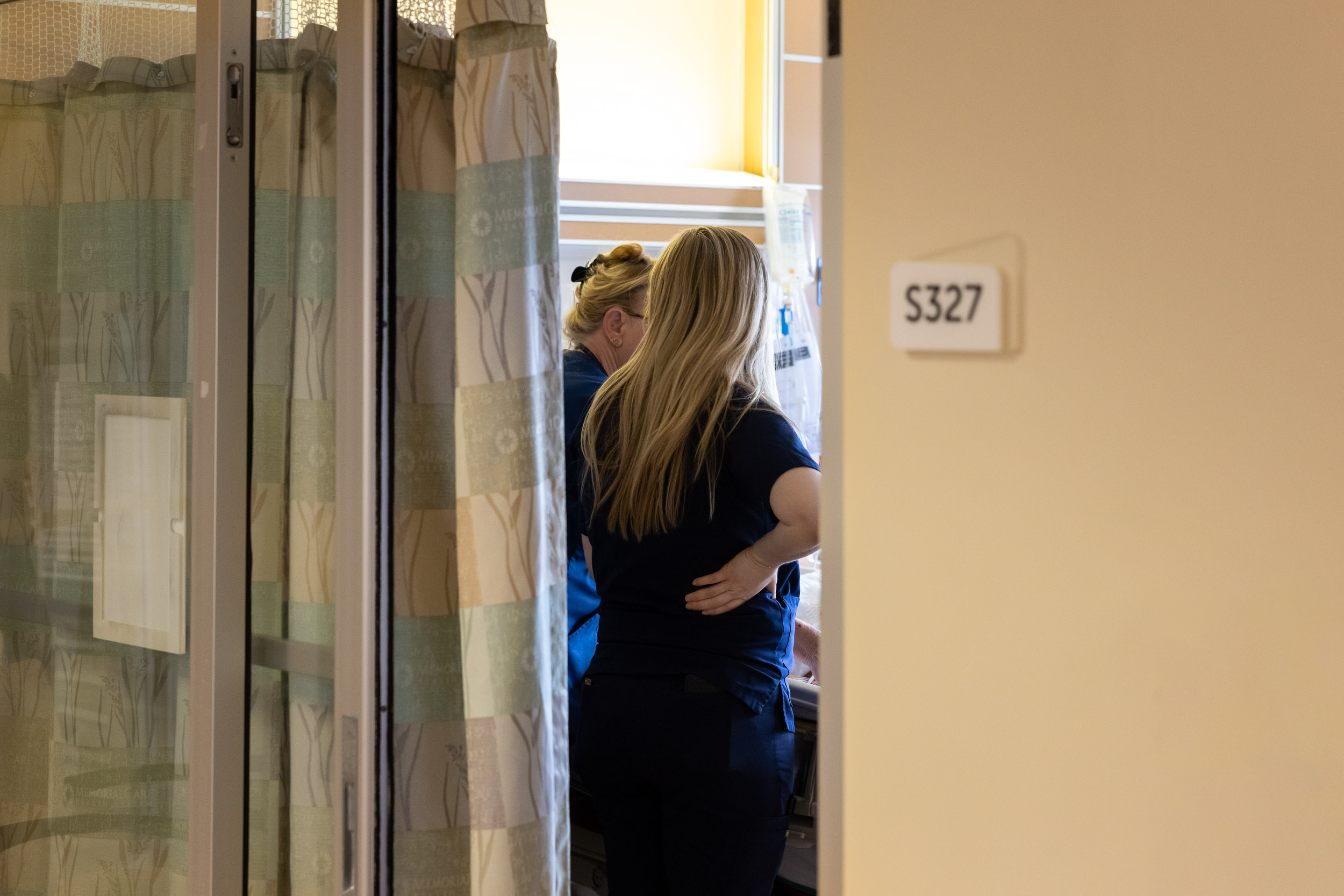 Long Beach Memorialcare of Long Beach Nurse Kirsten Shumaker checks on a patient.