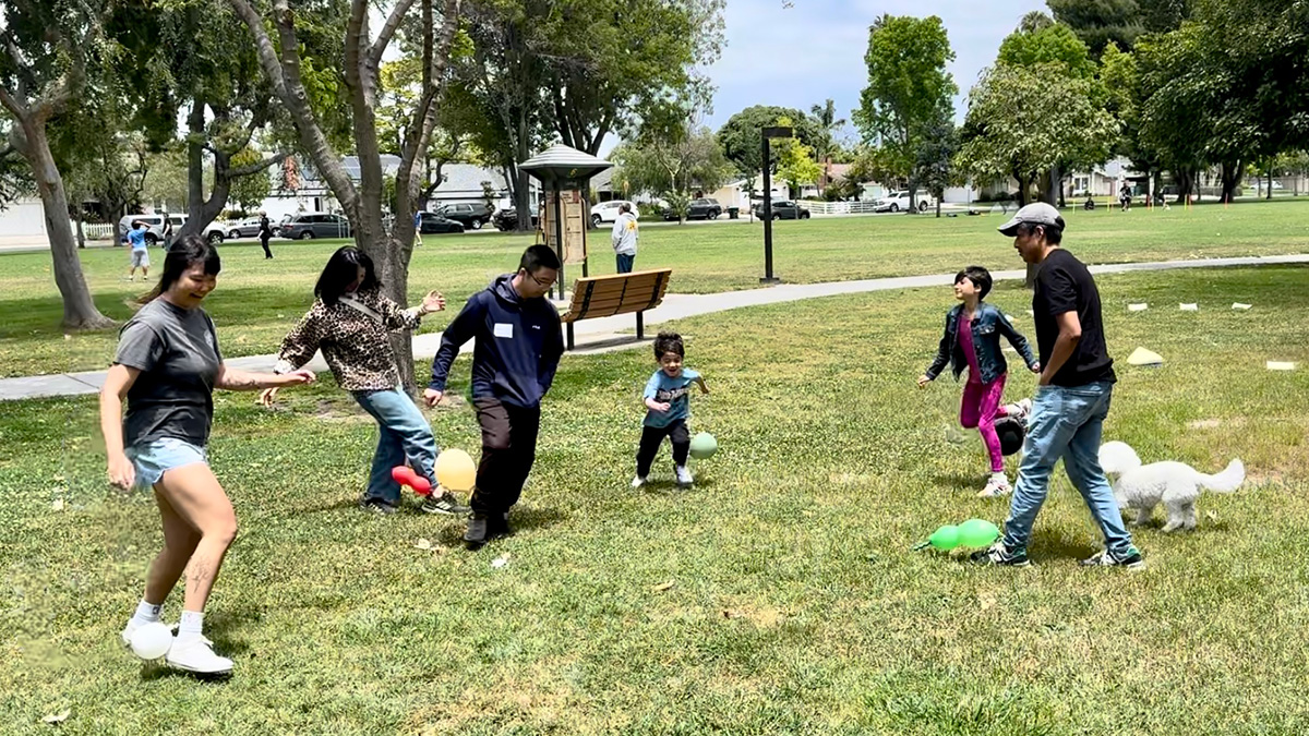 popping balloons in the park